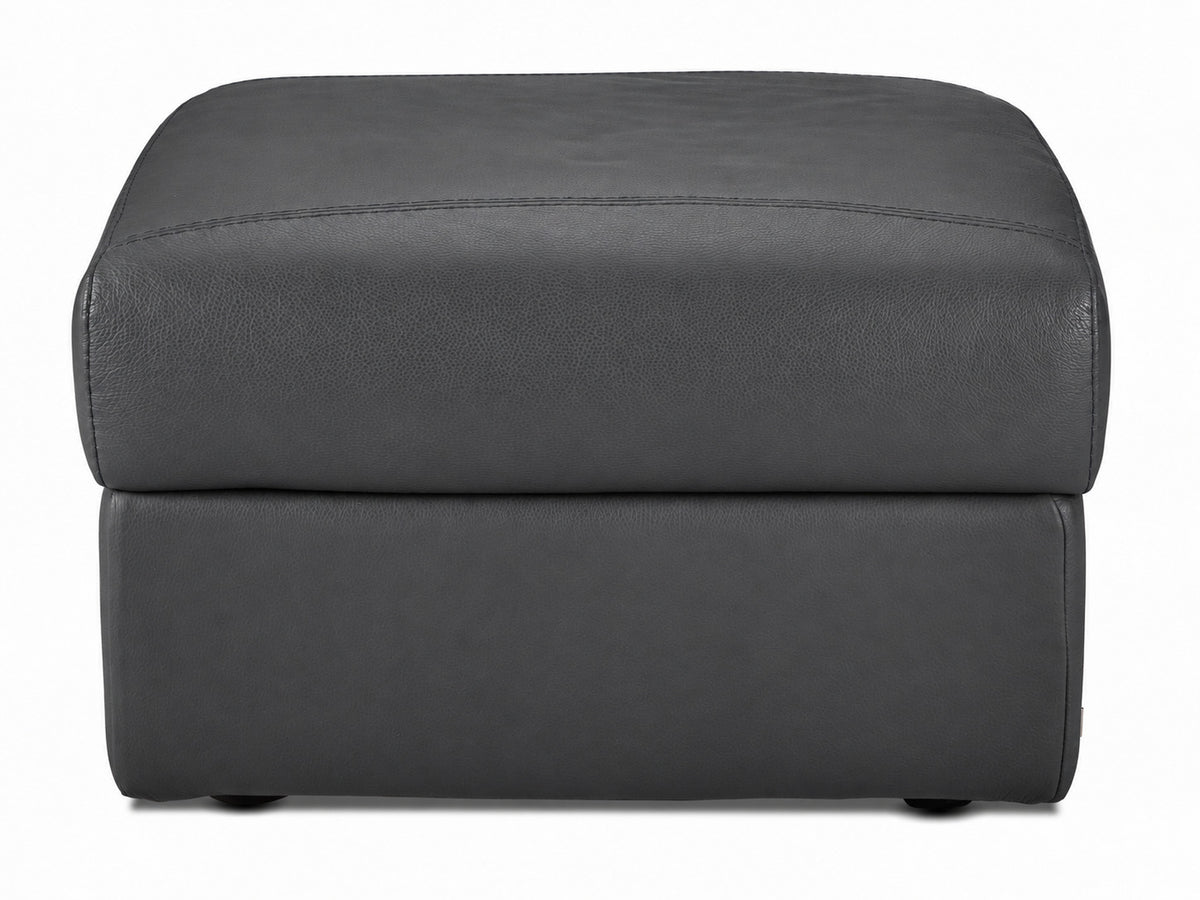 Front view of the square leather ottoman with thick padded top and low-profile feet