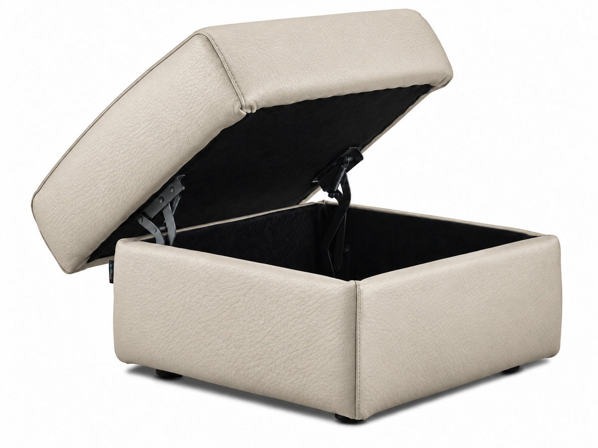 Cream leather ottoman with hinged top raised to reveal the black interior storage compartment