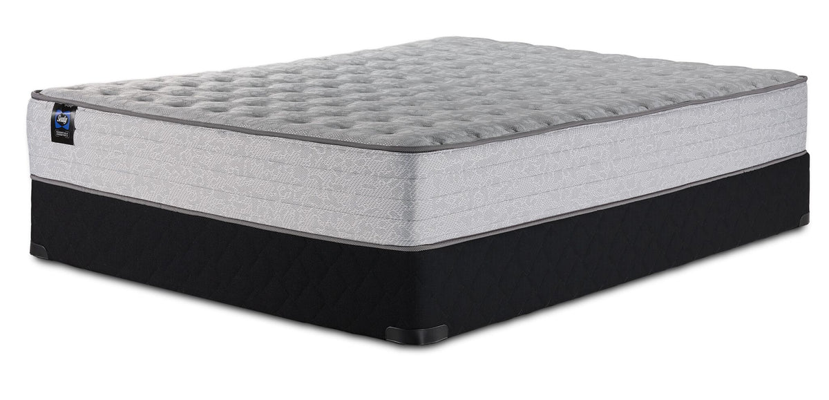 Sealy Burchelle Extra Firm Tight Top Twin mattress and black boxspring set, three-quarter view