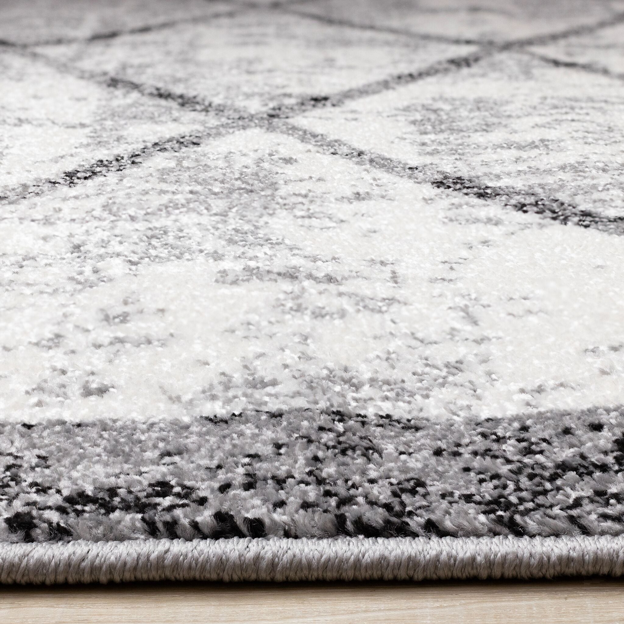 Ashwood 6'7" x 9'10" Distressed Lattice Area Rug - Grey, Black, White