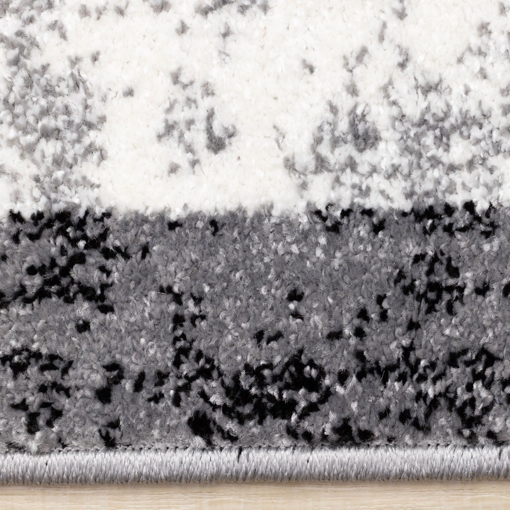 Ashwood 6'7" x 9'10" Distressed Lattice Area Rug - Grey, Black, White