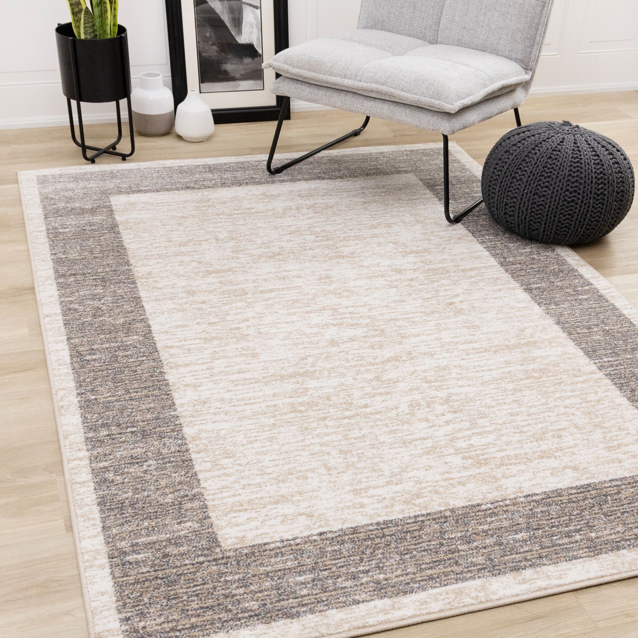 Earthly Essence 5'3" x 7'7" Distressed Border Area Rug - Taupe