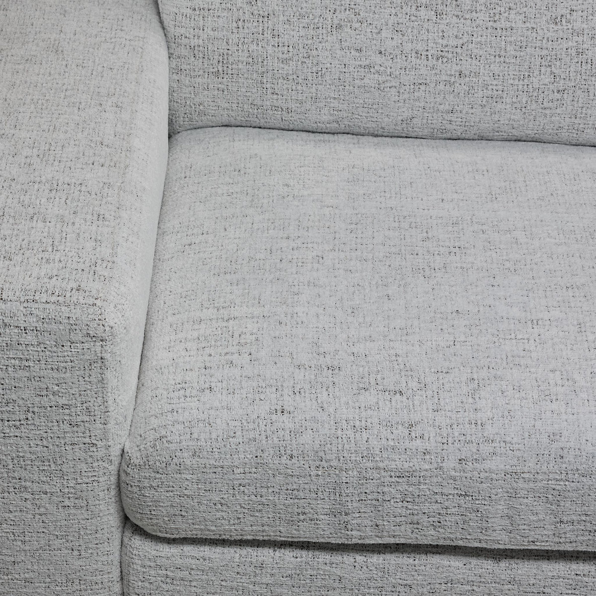 Delphine Power Slide-Out Sofa Bed - Off White close-up showing textured upholstery on the seat, backrest and arm