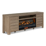 Great Falls 83.75" Fireplace TV Stand - Grey shown at an angle with electric fireplace, side cabinets and open media shelf