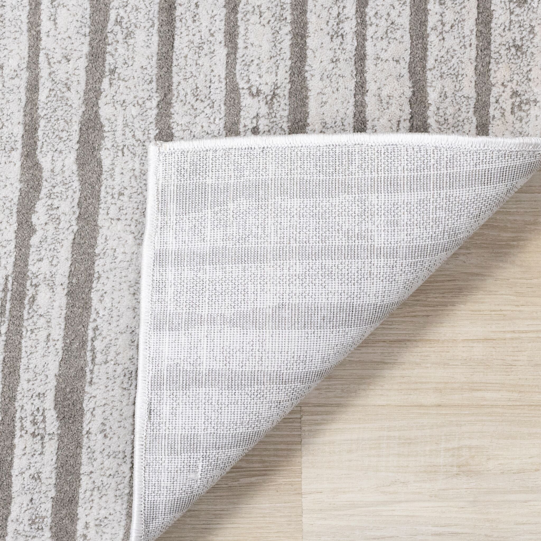 Hayden 6'7" x 9'6" Modern Lines Area Rug - Grey