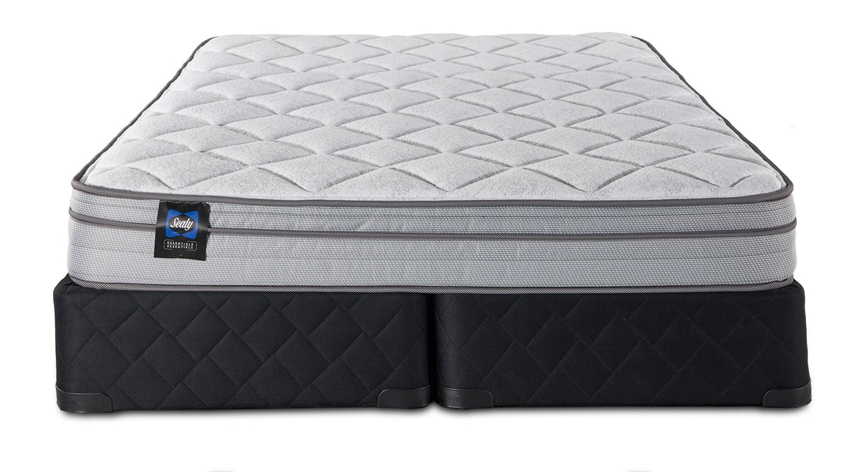 Front view of Sealy Essentials Kairo Medium Euro Top Queen mattress and split boxspring set with black quilted base