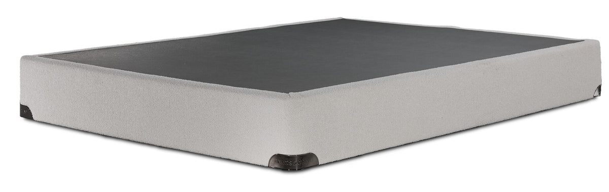 Kingsdown White Boucle queen boxspring with beige polyester upholstery and a black support surface, angled view