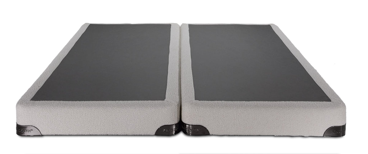 Front view of the Kingsdown White Boucle queen split low-profile boxspring with two beige foundation pieces