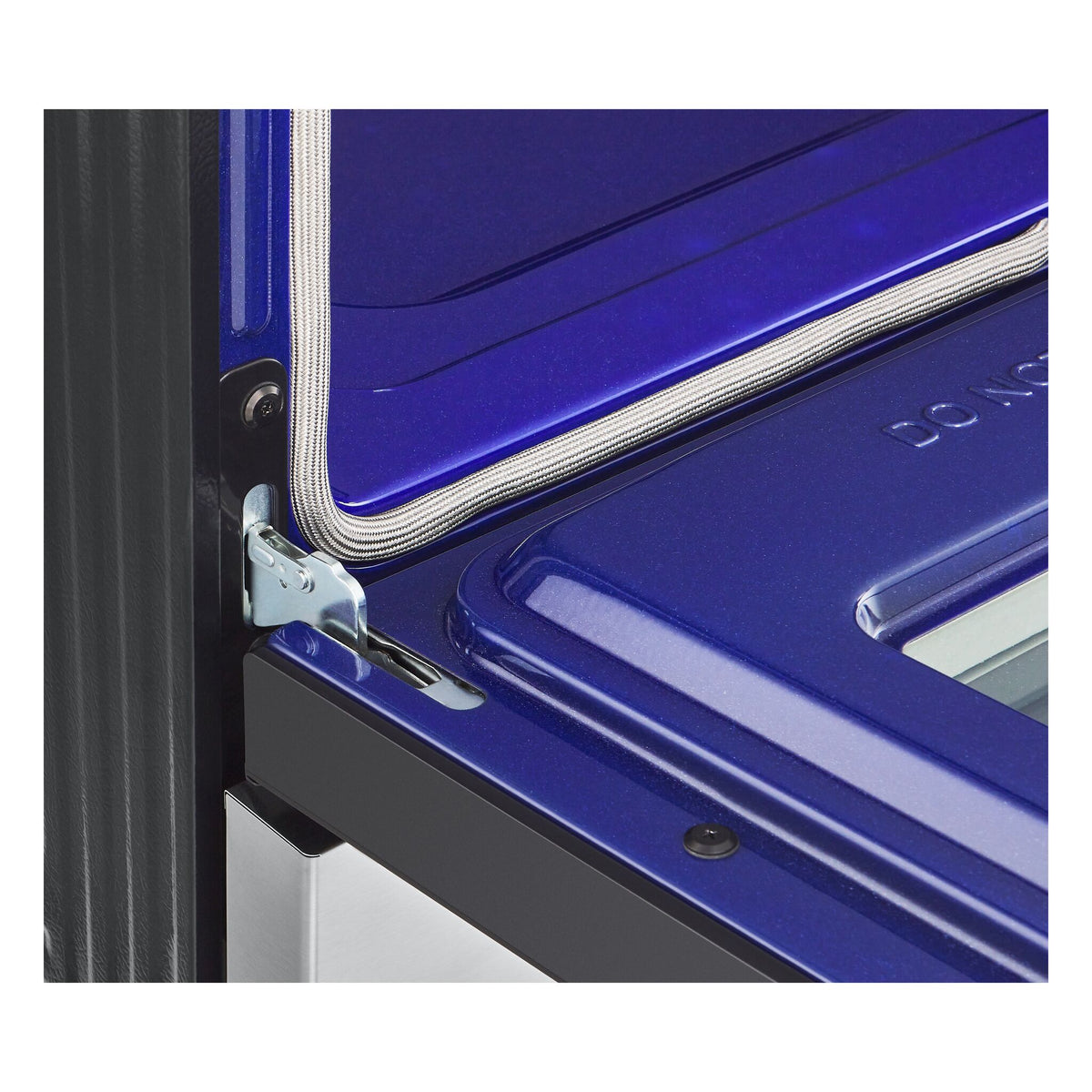 Close-up of LG electric range blue oven door interior showing hinge, gasket and EasyClean enamel finish