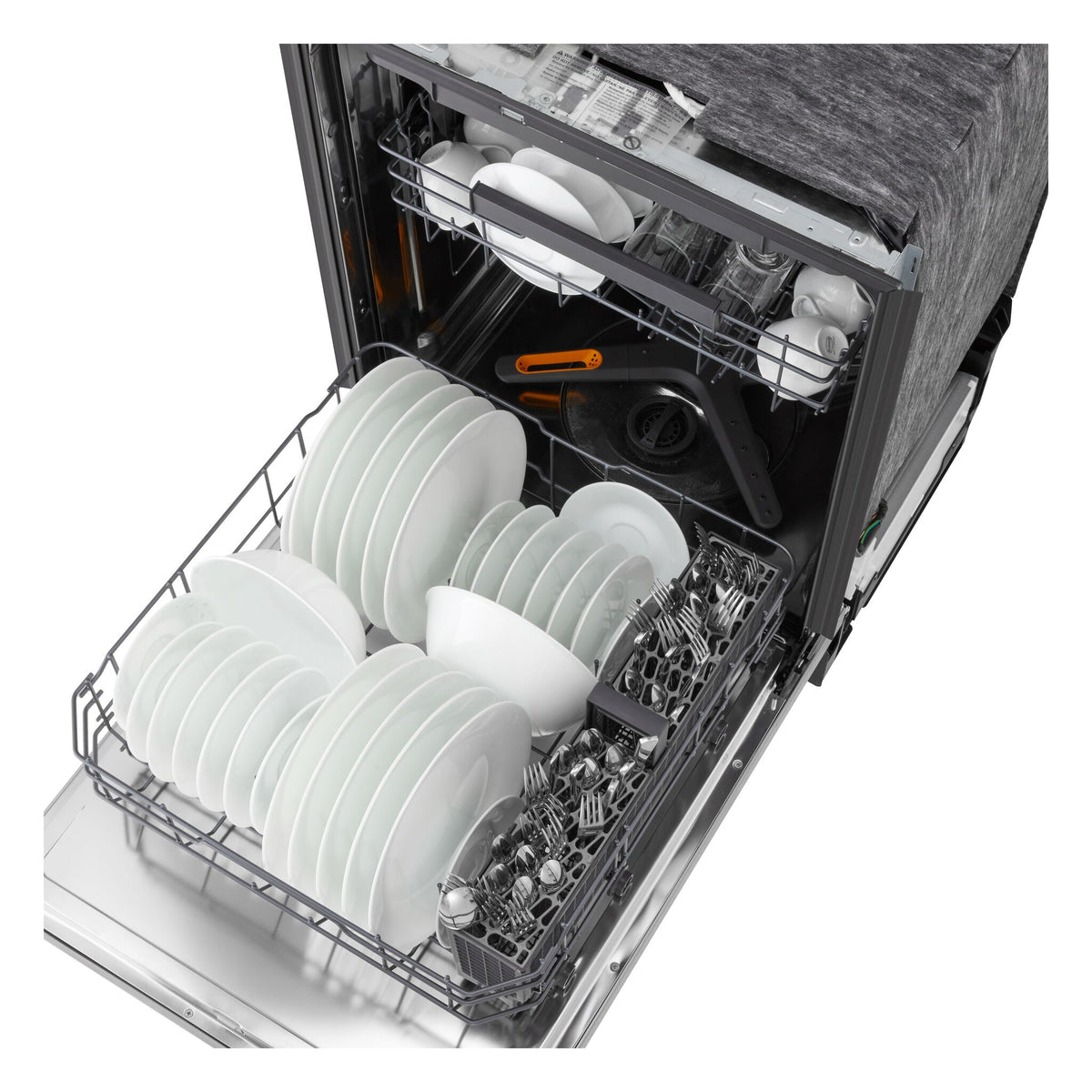 Top-down view of LG dishwasher loaded with plates, bowls, glasses and cutlery in adjustable racks
