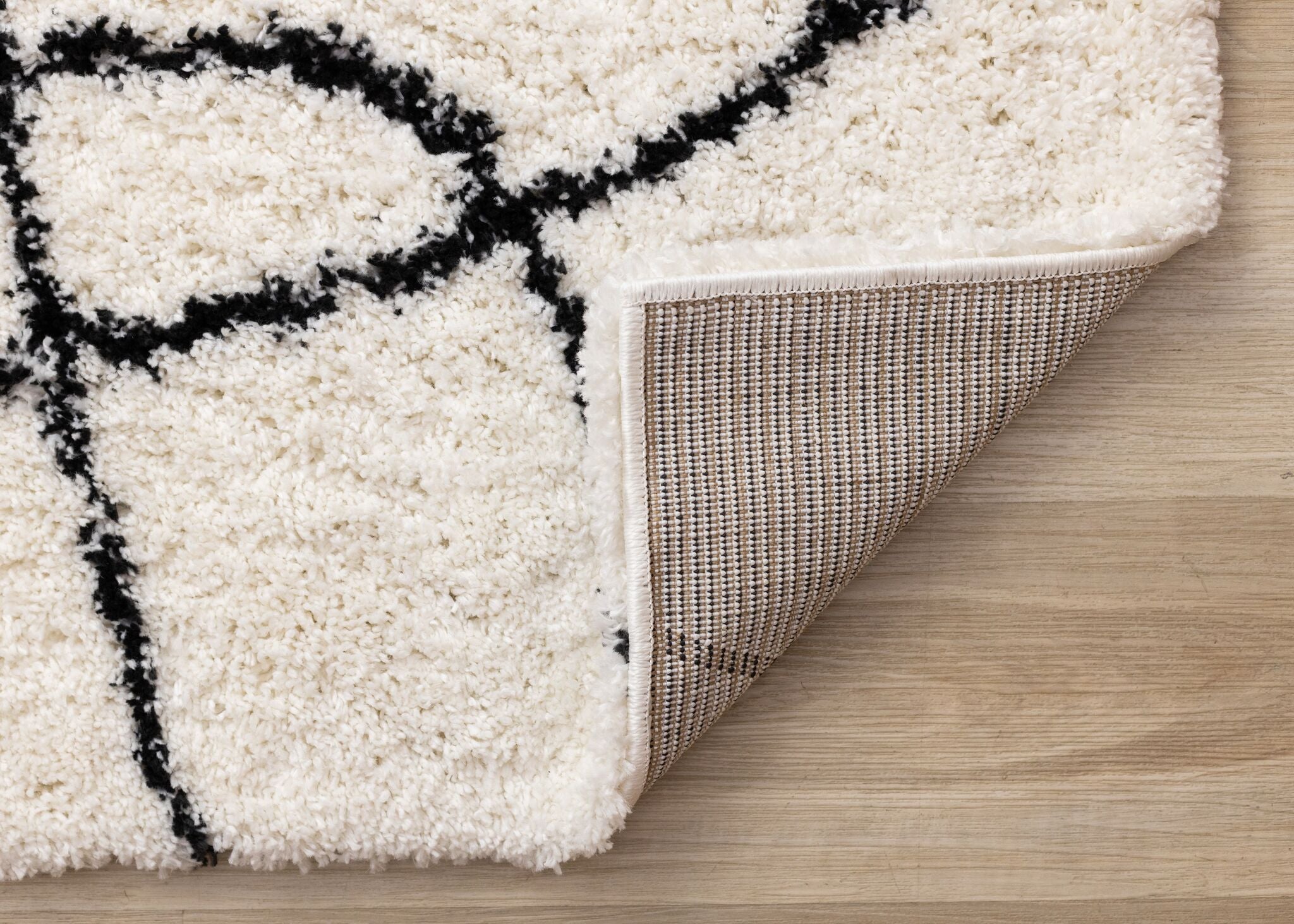 Pace 5'3" x 7'7" Outlinded Shapes Area Rug - Cream, Black