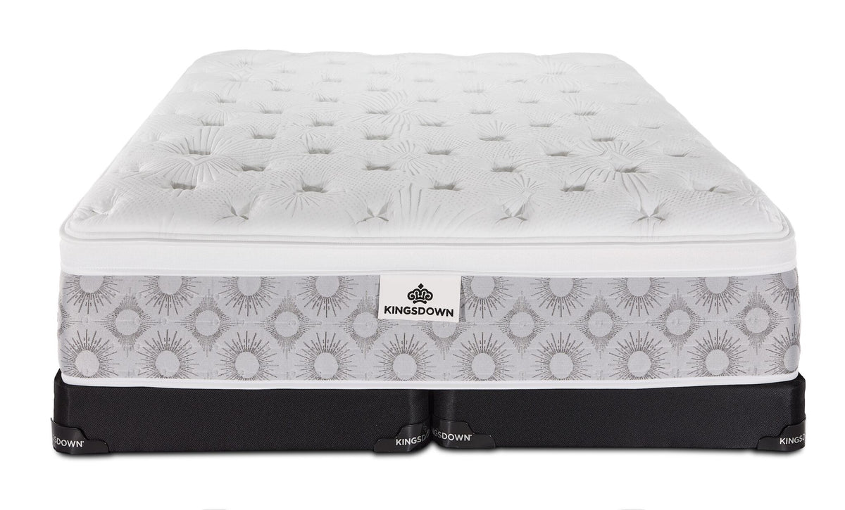 Front view of the Kingsdown Quinlan Plush Euro Top queen mattress with two black split low-profile boxsprings