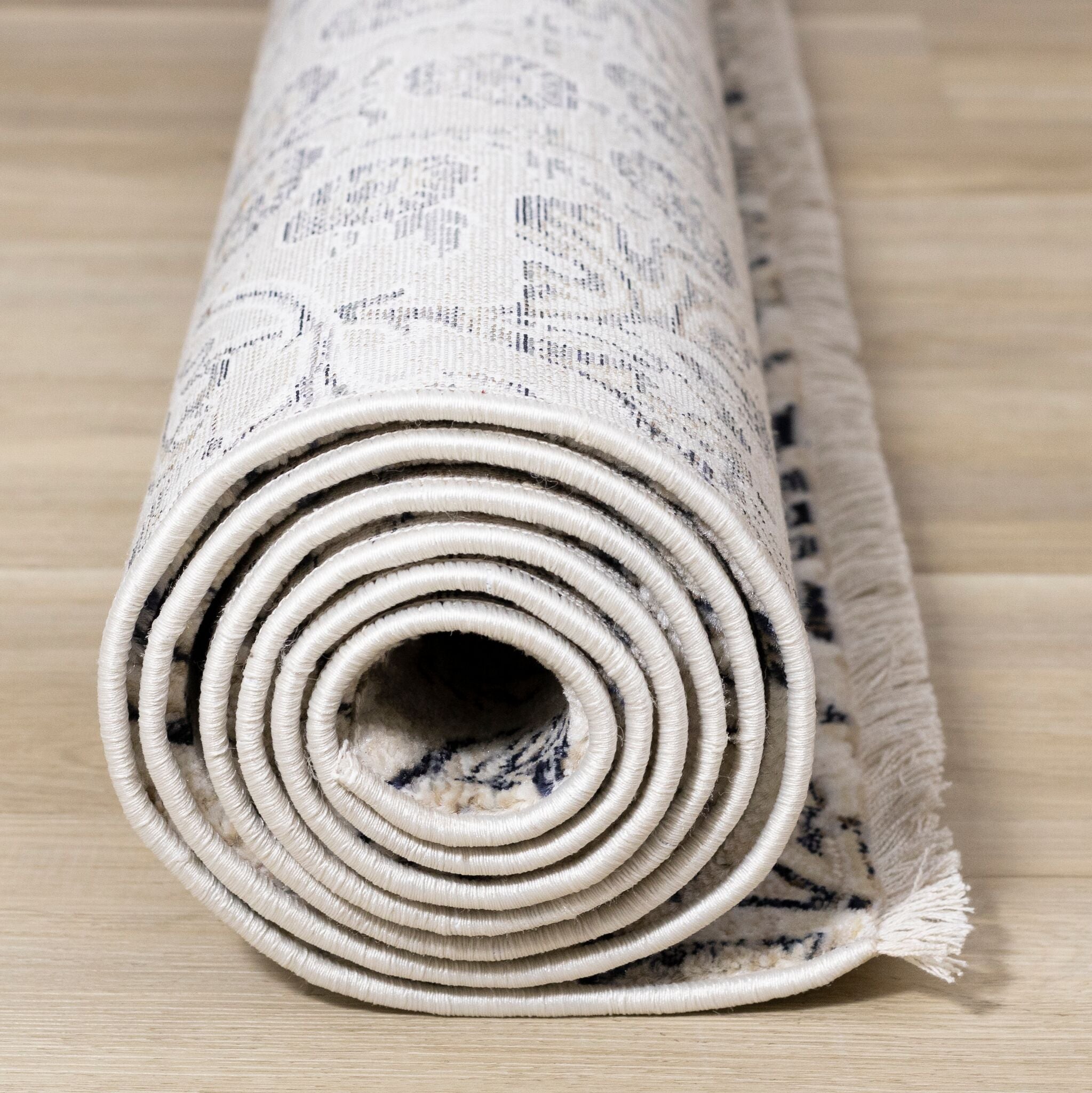 Midnight Garden 5'3" x 7'10" Ornate Leaf Pattern Area Rug - Cream