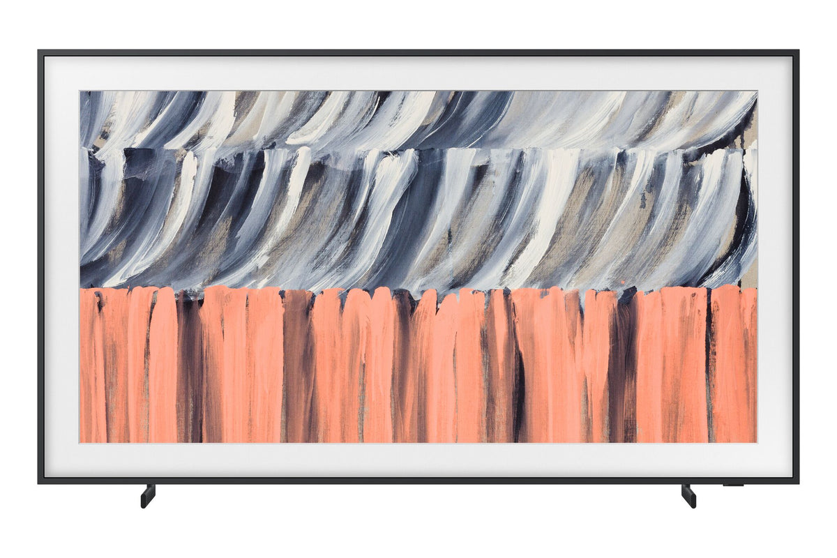 Front view of Samsung 85-inch The Frame LS03HE 4K Smart TV on stand feet, displaying blue, white and coral abstract artwork