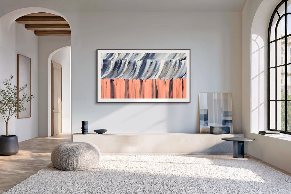 Samsung 55-inch The Frame LS03HE Smart TV mounted like framed artwork in a bright modern living room with arched windows and neutral decor