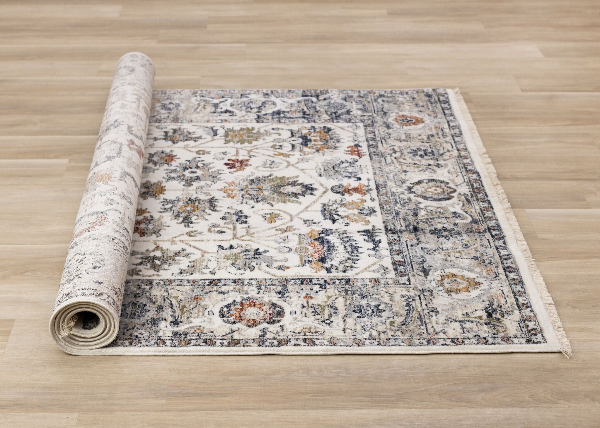 Serene 5'3" x 7'7" Intricate Border Area Rug