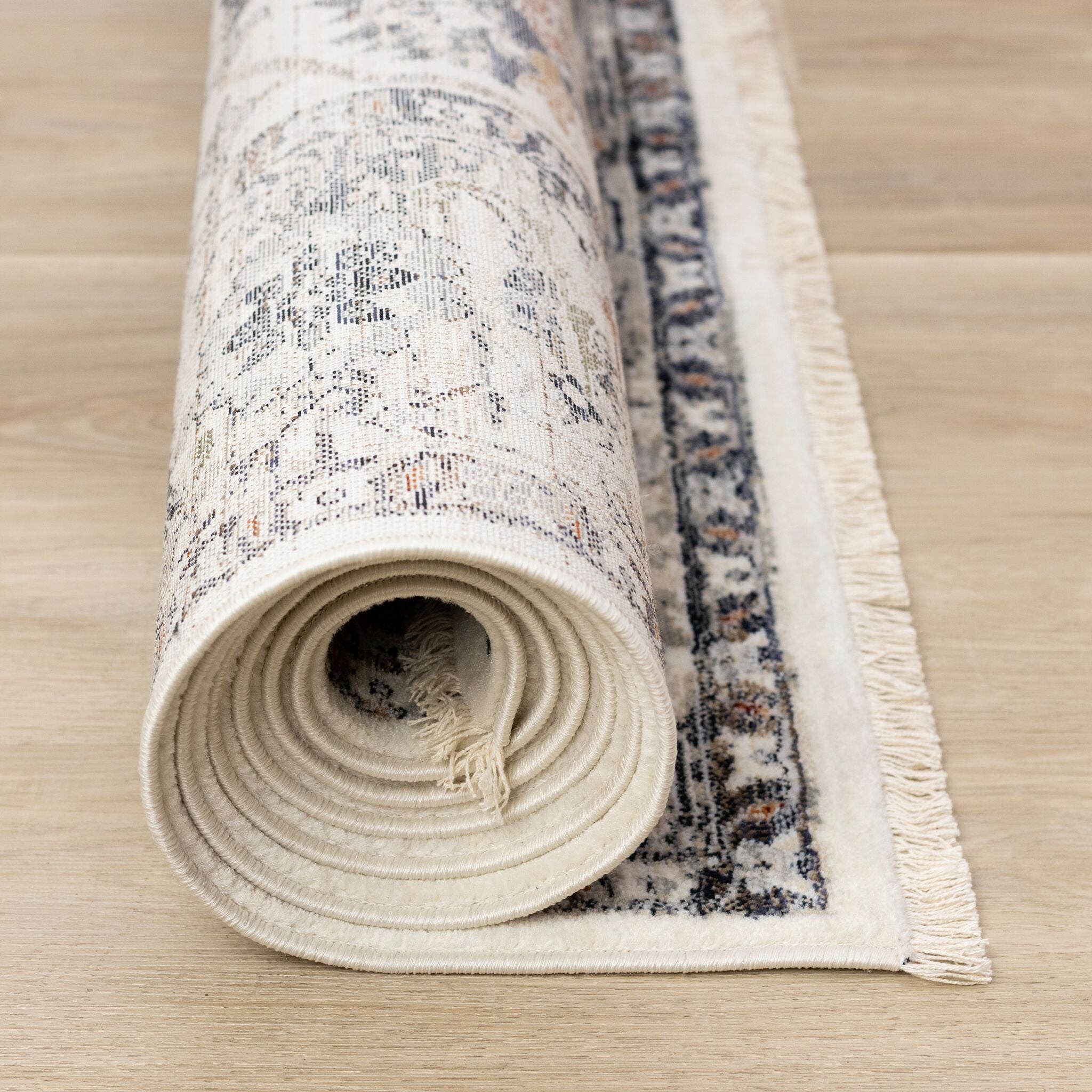 Serene 5'3" x 7'7" Intricate Border Area Rug