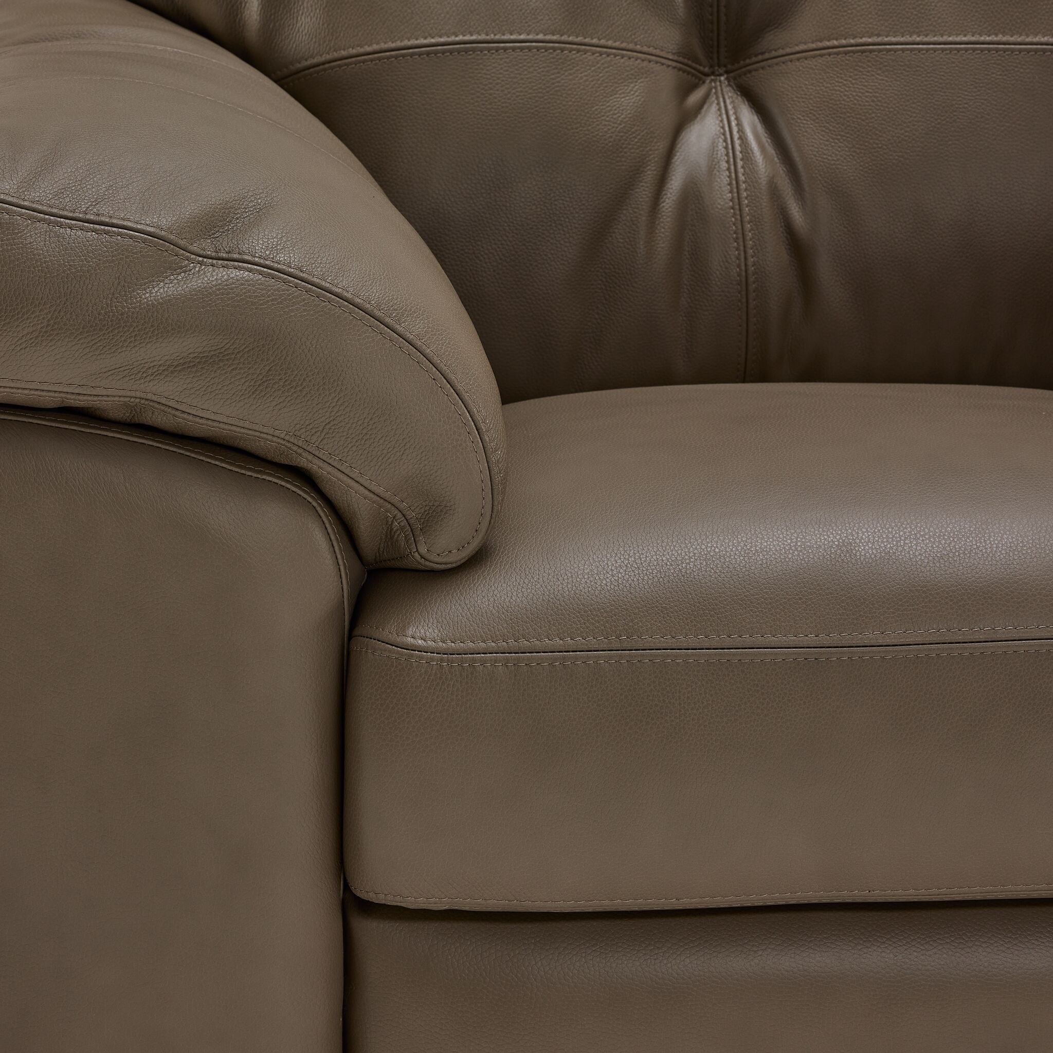 Sloan II loveseat close-up showing chocolate leather upholstery, seat cushion and stitching detail