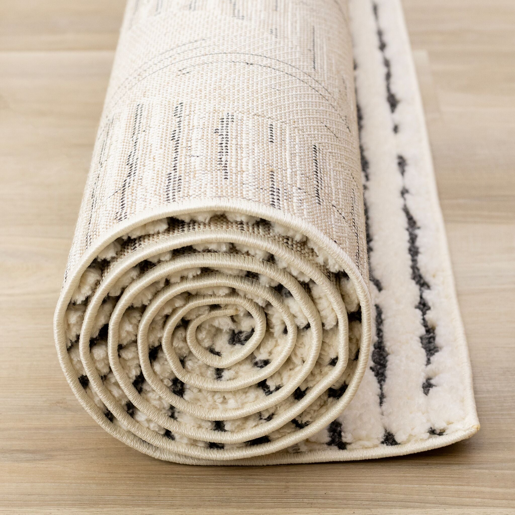 Talia 5'3" x 7'7" Striped Diamond Design Area Rug - Cream, Black