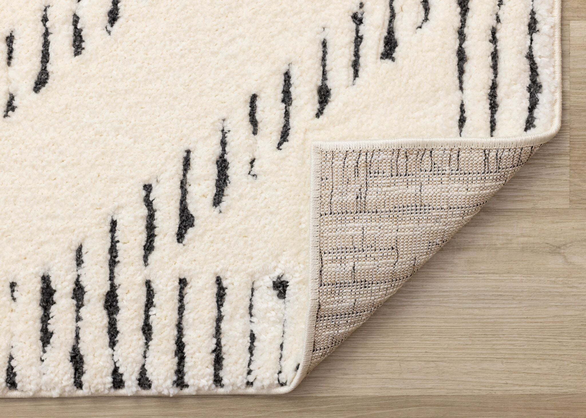 Talia 6'7" x 9'6" Striped Diamond Design Area Rug - Cream, Black