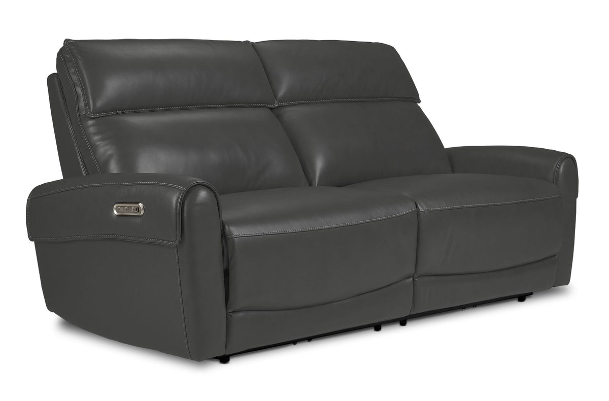 Theo Leather Dual Power Reclining Sofa from the 3-piece set - Granite shown at an angle with plush back cushions and padded arms