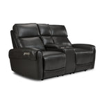 Theo Leather Dual Power Reclining Loveseat with Console - Charcoal shown at an angle with plush cushions, padded arms and centre console