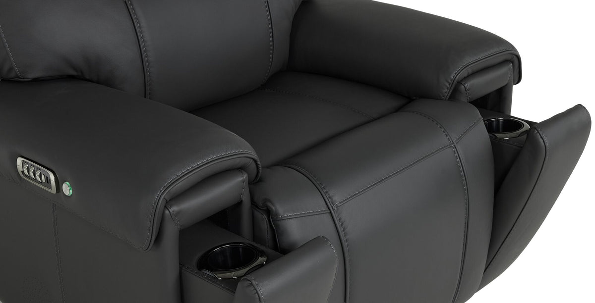 Velocity home theatre recliner close-up showing hidden cupholders in the front arm panels and dark grey upholstery