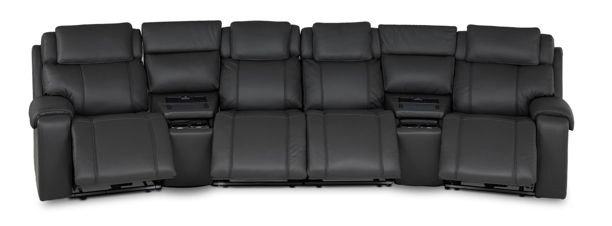 Velocity dark grey home theatre seating front view with four extended footrests and two integrated wedge consoles