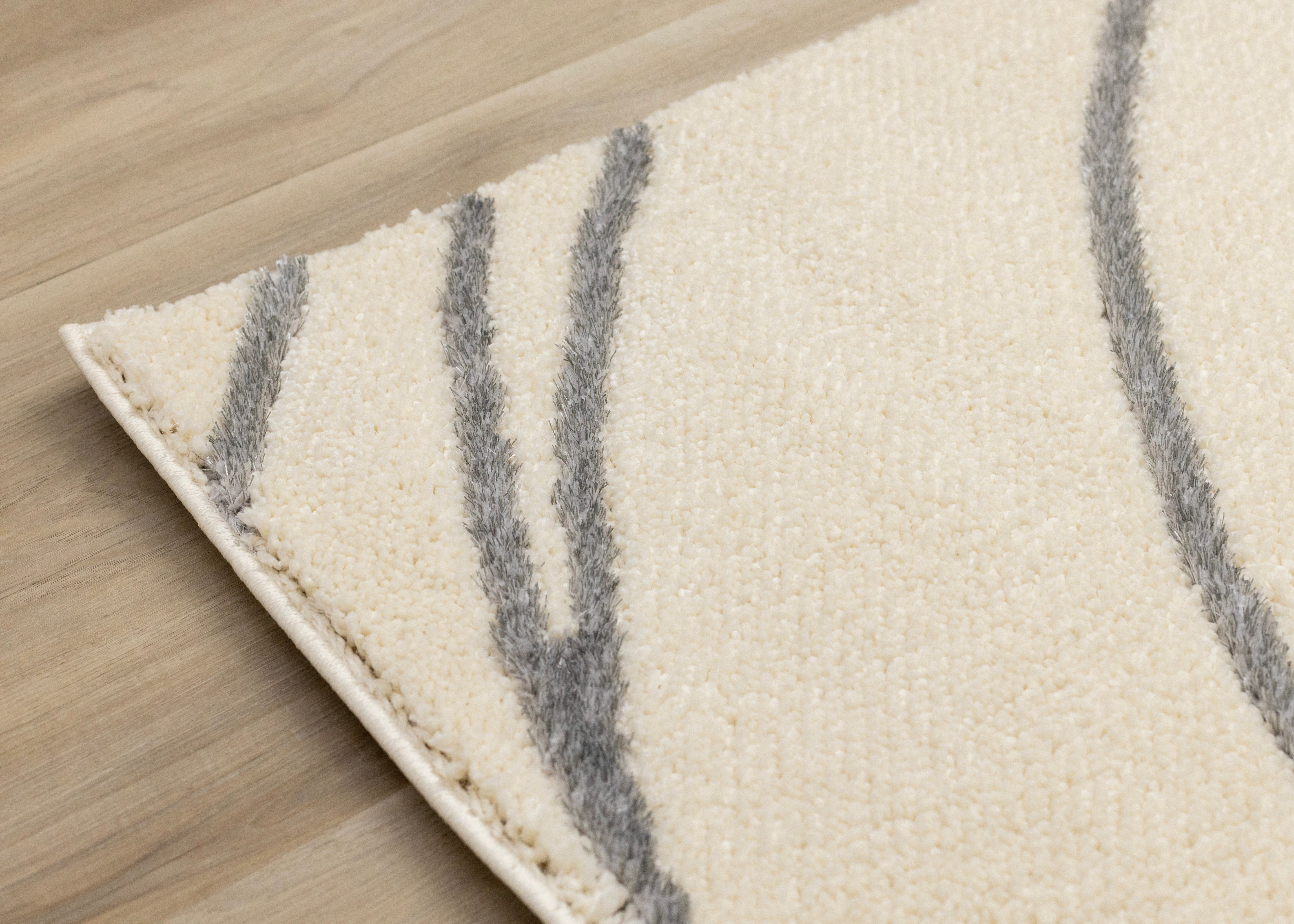 Sully 6'7" x 9'6" Circle Swirl Area Rug - Cream