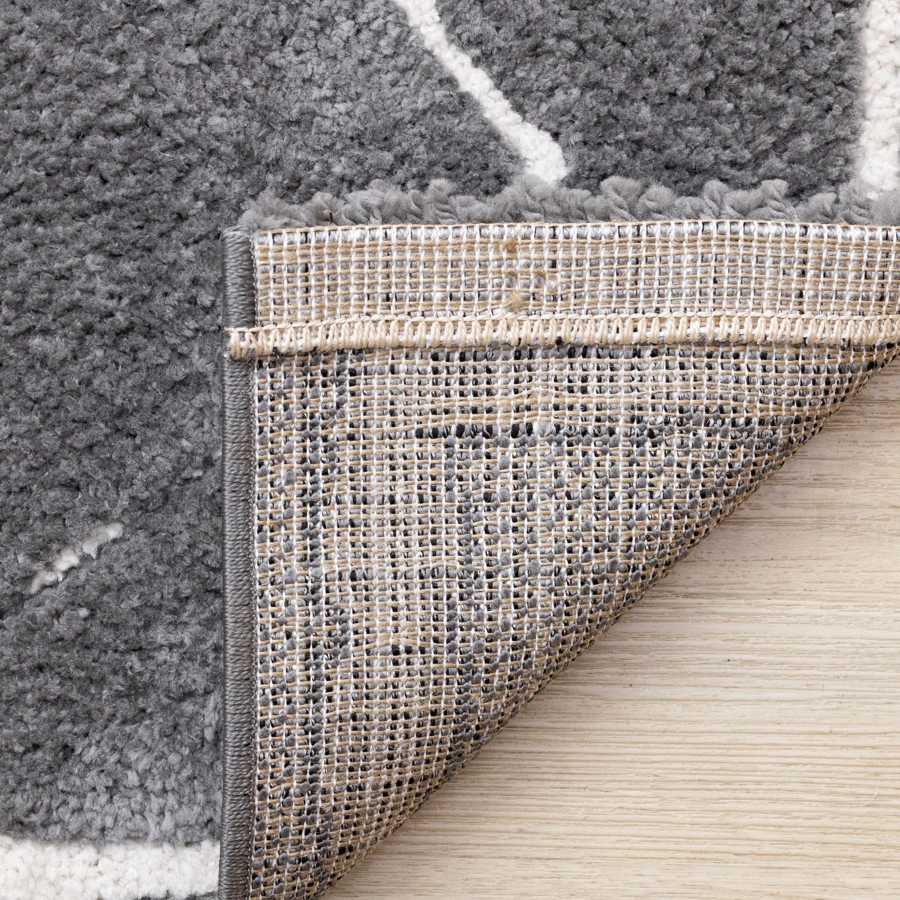 Obsidian 6'7" x 9'6" Broken Lattice Area Rug - Grey, White