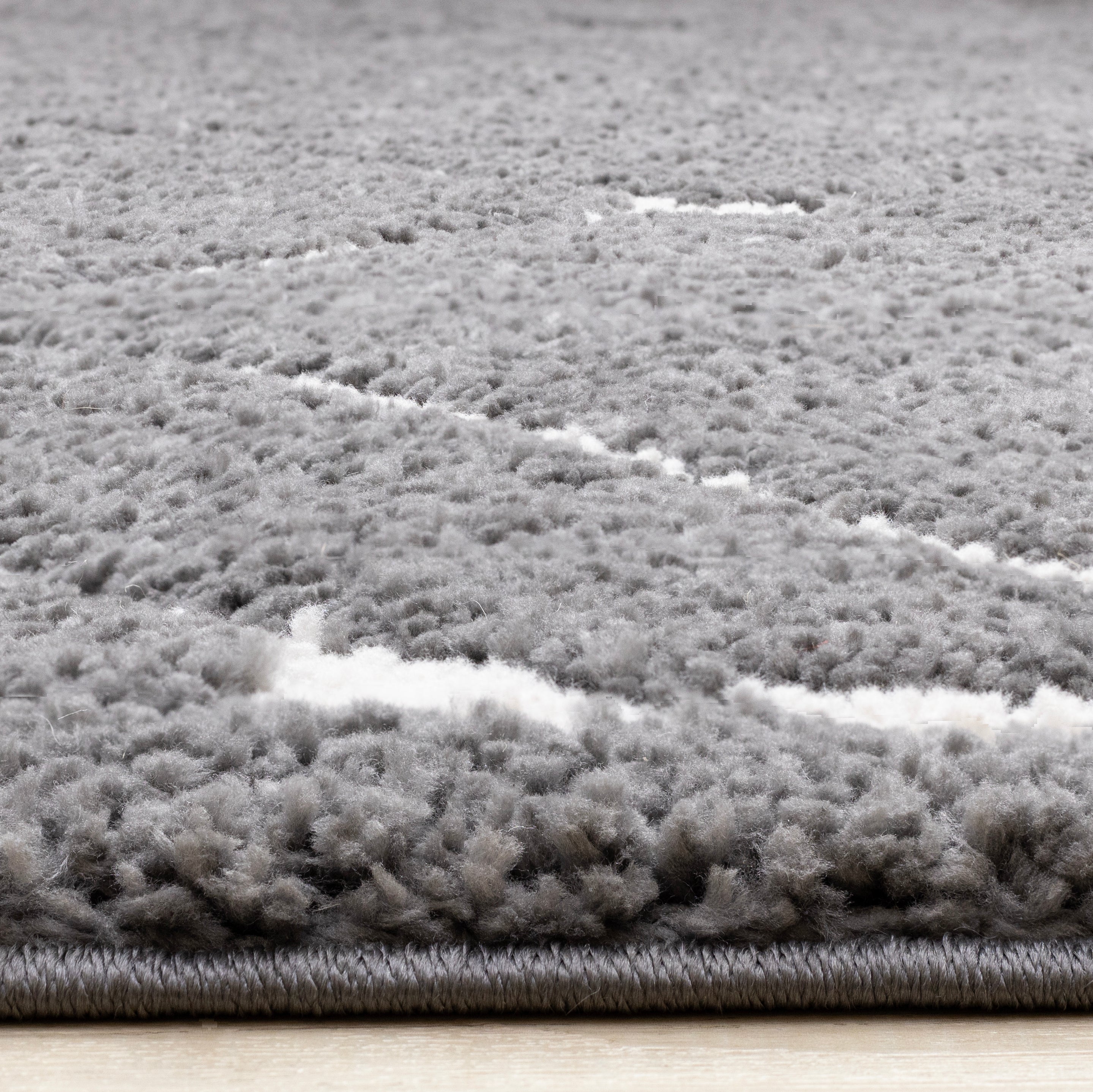 Obsidian 6'7" x 9'6" Broken Lattice Area Rug - Grey, White
