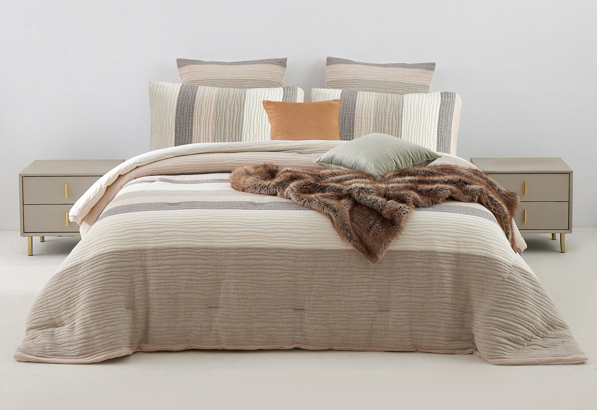The Great Indoors 5-Piece King Comforter Set in cream, beige and grey stripes styled on a bed with coordinating pillows