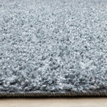 Brio 6'7" x 9'10" Shag Area Rug - Blue