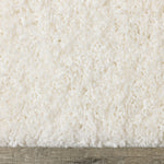 Brio 5'3" x 7'7" Shag Area Rug - Cream
