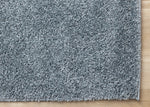 Brio 6'7" x 9'10" Shag Area Rug - Blue