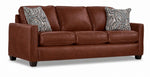 City Leather Sofa - Brown in a three-quarter view with three seat cushions, slim track arms, dark wood legs and two patterned accent pillows
