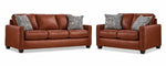 City Leather Sofa and Loveseat Set - Brown with matching leather seating, patterned accent pillows and dark wood legs