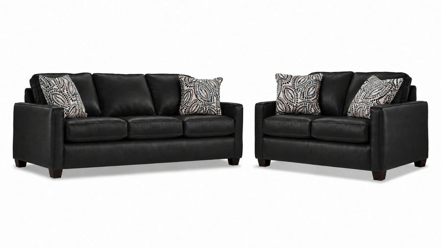 City Leather Sofa and Loveseat Set - Black with matching leather seating, patterned accent pillows and dark wood legs