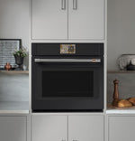 CAFÉ™ Professional Series 30" Matte Black Smart Wall Oven built into modern kitchen cabinetry