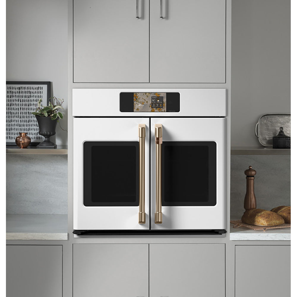 CAFÉ™ Professional Series 30" Matte White French-Door Wall Oven built into modern kitchen cabinetry