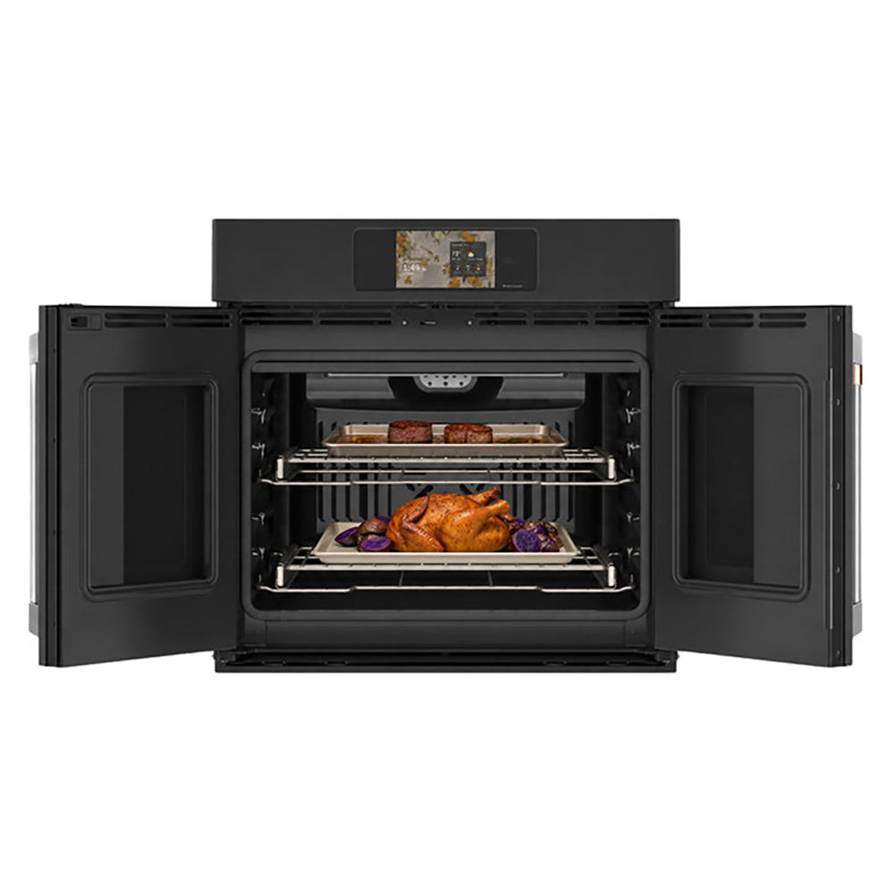 CAFÉ™ Professional Series 30" Matte Black French-Door Wall Oven open with roasting trays on two racks