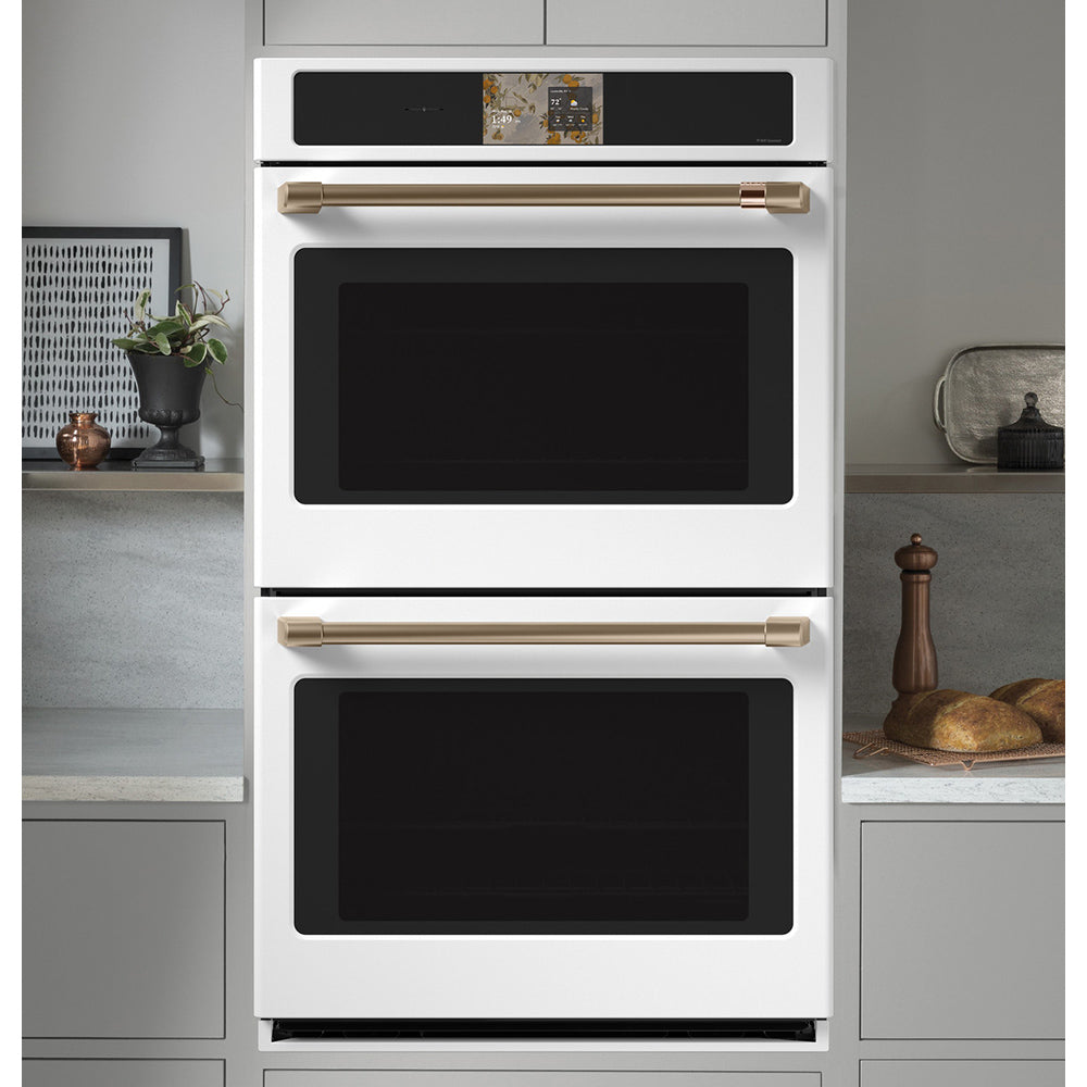 CAFÉ™ Professional Series 30" Matte White Double Wall Oven built into modern kitchen cabinetry