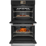 CAFÉ™ Professional Series 30" Matte Black Double Wall Oven open with steaks above and roast chicken below