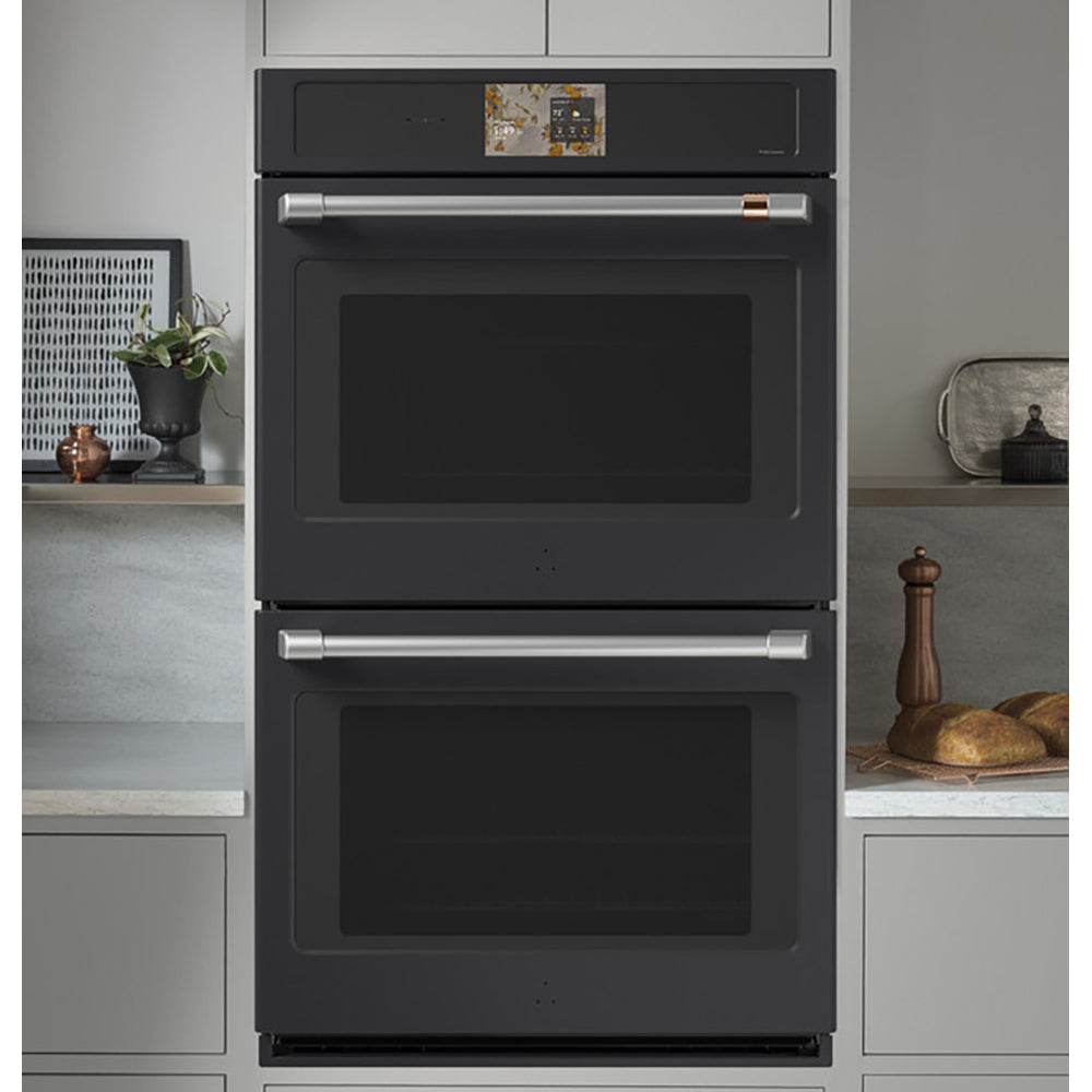 CAFÉ™ Professional Series 30" Matte Black Double Wall Oven built into modern kitchen cabinetry