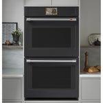 CAFÉ™ Professional Series 30" Matte Black Double Wall Oven built into modern kitchen cabinetry