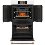 CAFÉ™ 30" Matte White French-Door Double Wall Oven open with steaks above and roast chicken below