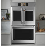 CAFÉ™ 30" Stainless Steel French-Door Double Wall Oven built into modern kitchen cabinetry