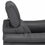Side close-up showing the adjustable headrest mechanism and dark grey leather upholstery