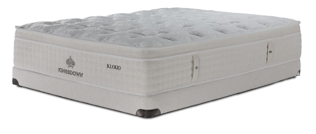 Three-quarter view of Kingsdown Atmosphere Firm Euro Top Queen Mattress and Low Profile Boxspring Set in beige.