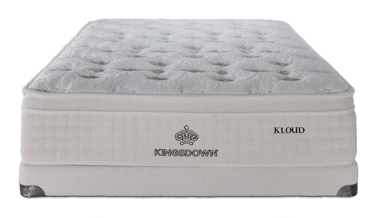 Front view of Kingsdown Atmosphere Plush Euro Top Queen mattress on matching low profile boxspring